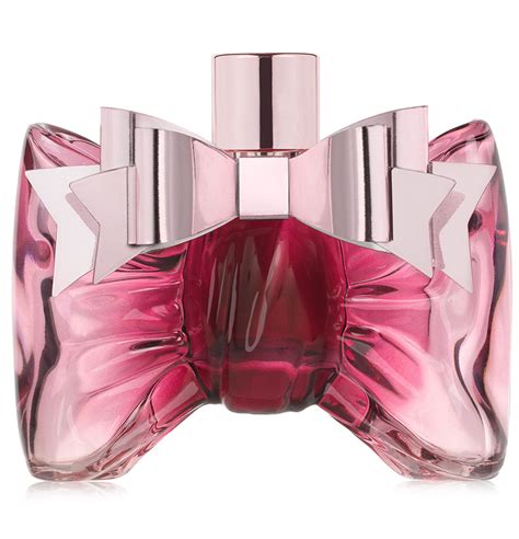 perfume pink bottle with bow